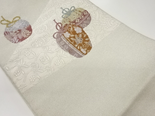 綴れ切り嵌め風花唐草に仕覆模様織出し名古屋帯